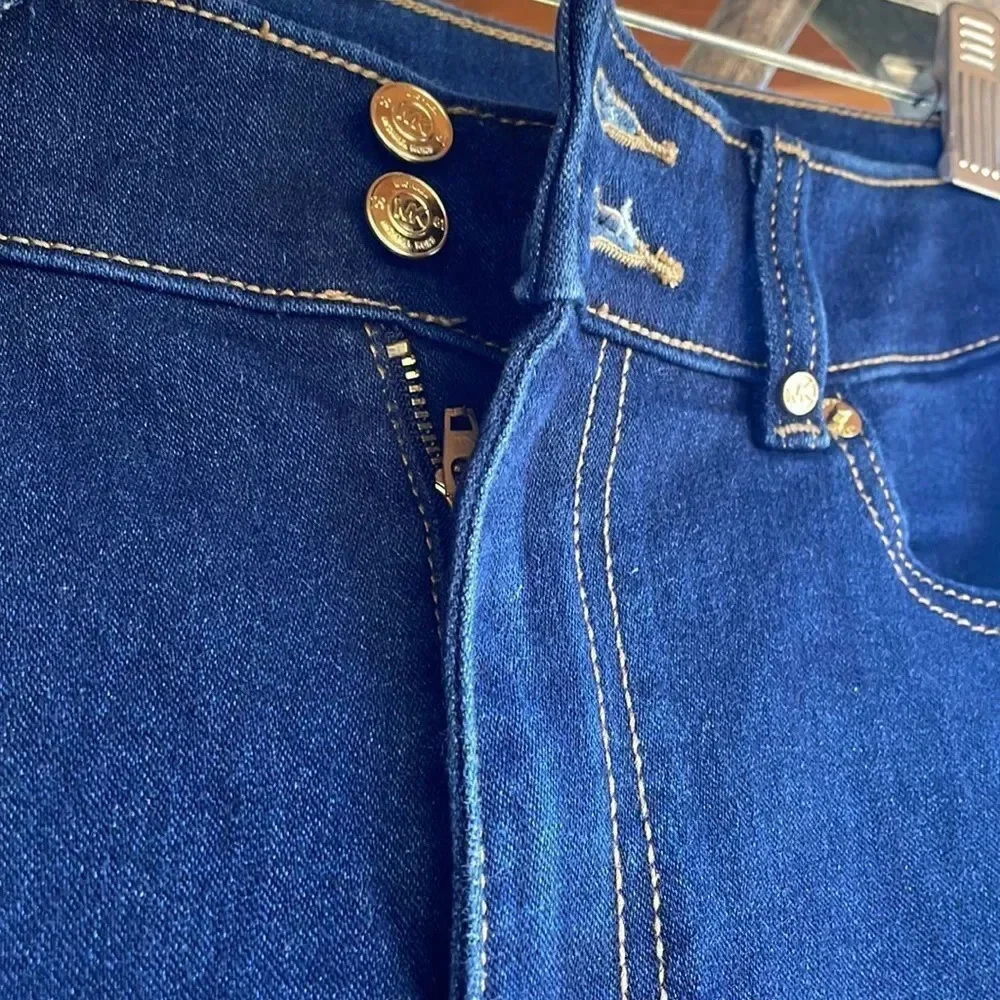 Michael Kors woman’s dark blue jeans. They are a size 10